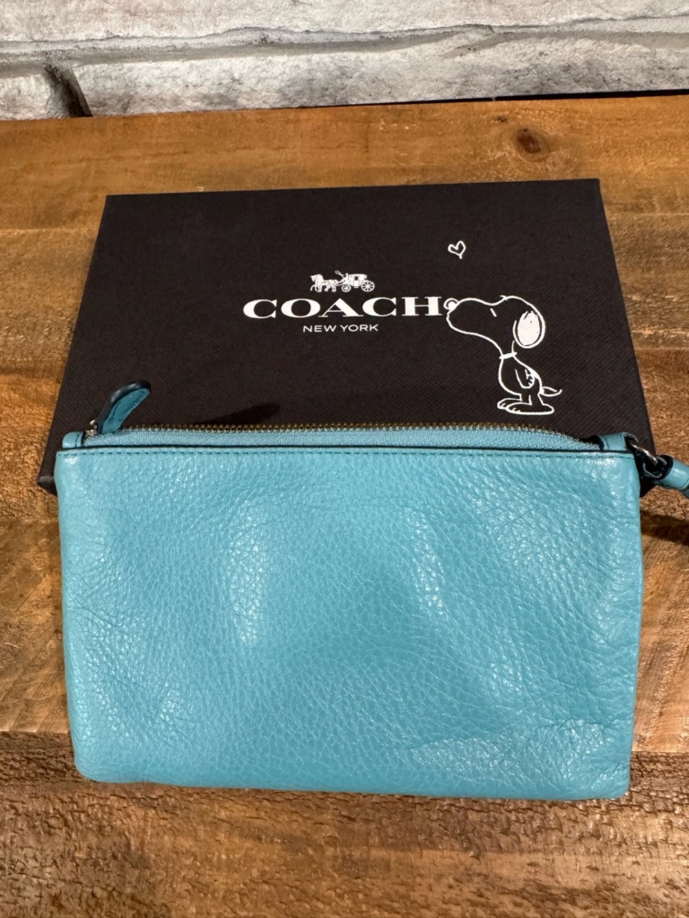 Coach x Peanuts Teal Leather Wristlet with Woodstock - Picture 3 of 3
